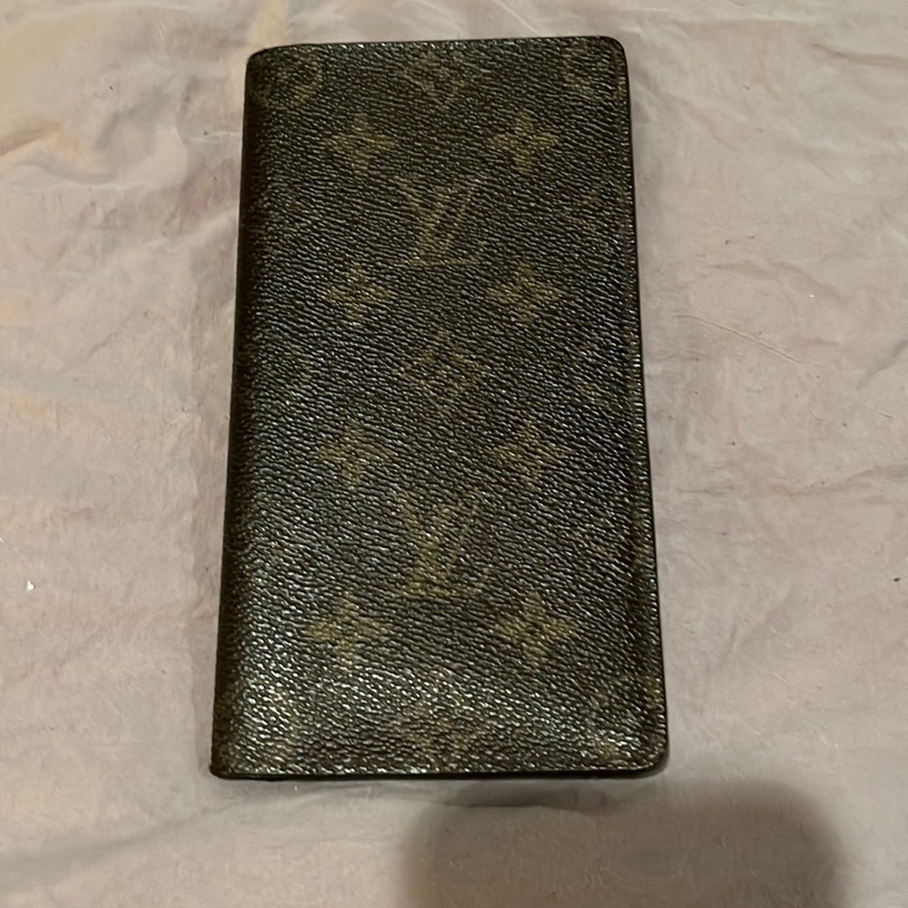 Authentic Louis Vuitton check book wallet.